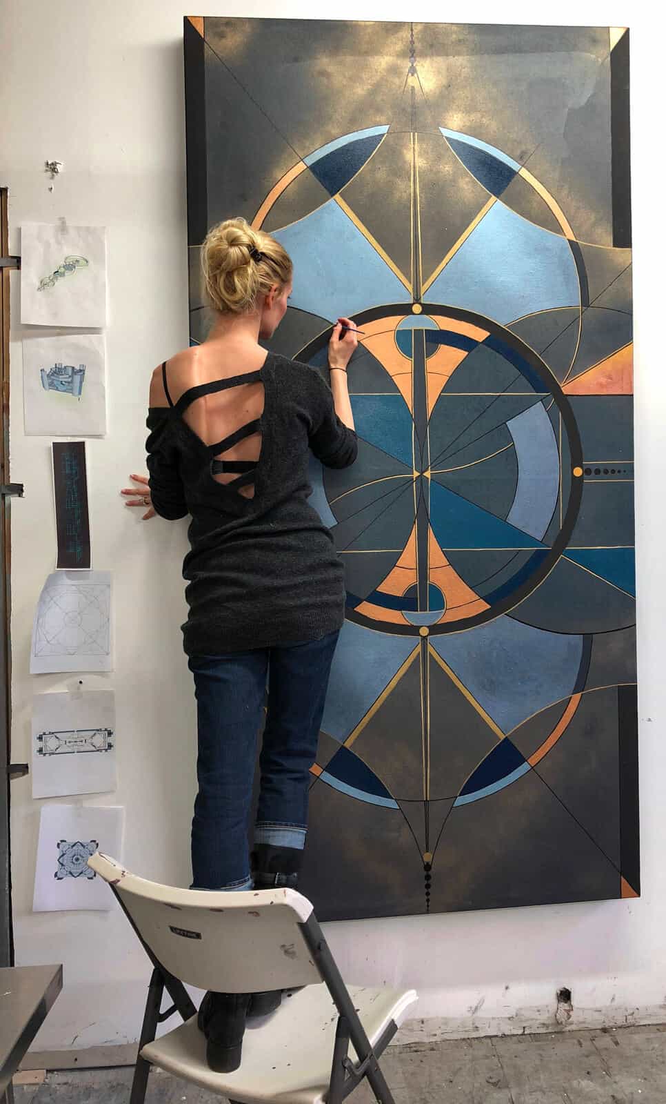 Kathleen Werner with the Etazin Chair sculpture